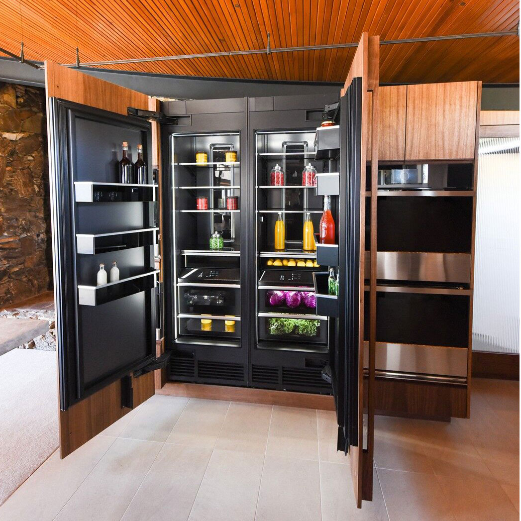 JennAir refrigerator, open with beautiful, dark interior